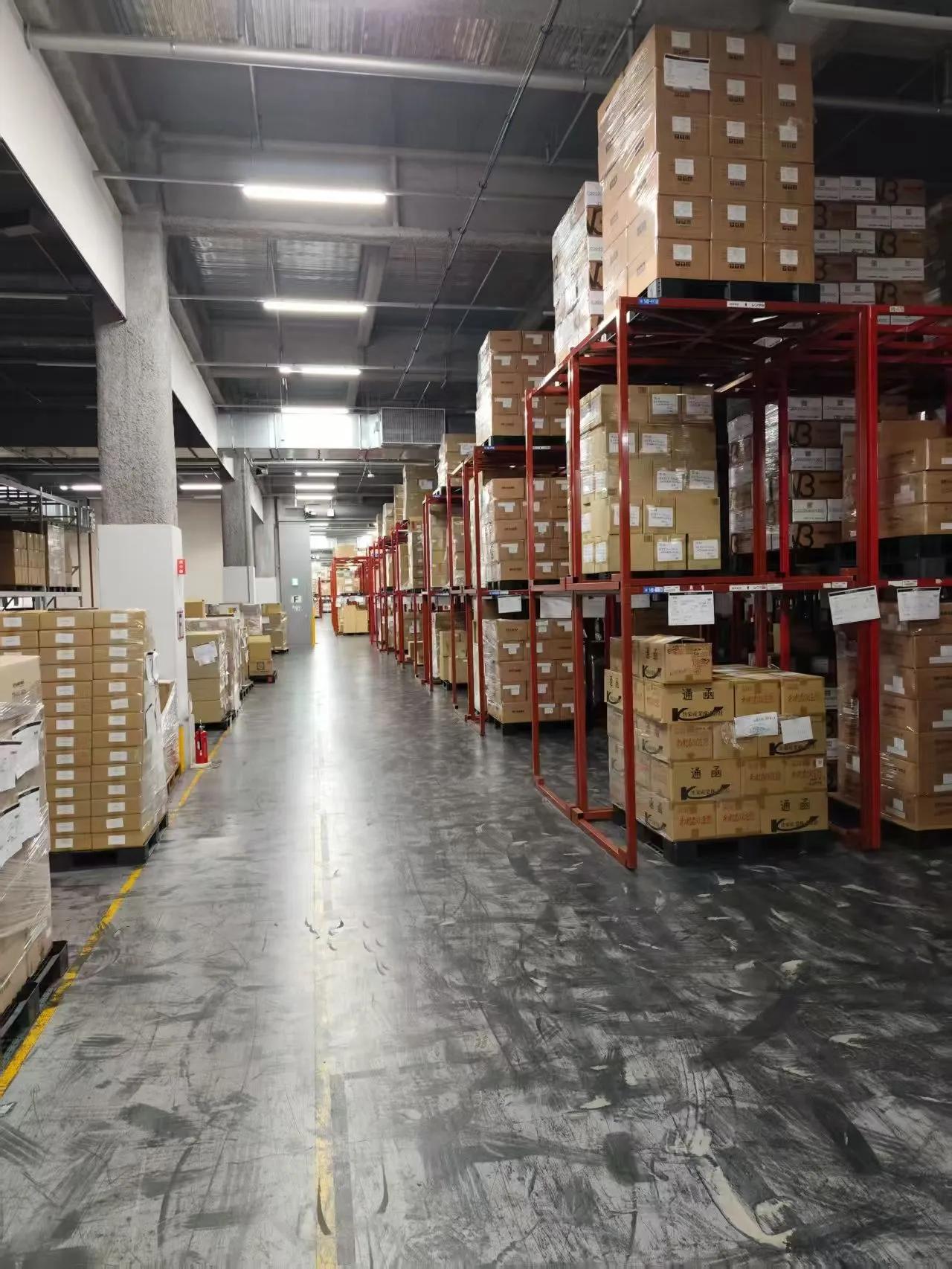 Commercial freight being handled in a warehouse